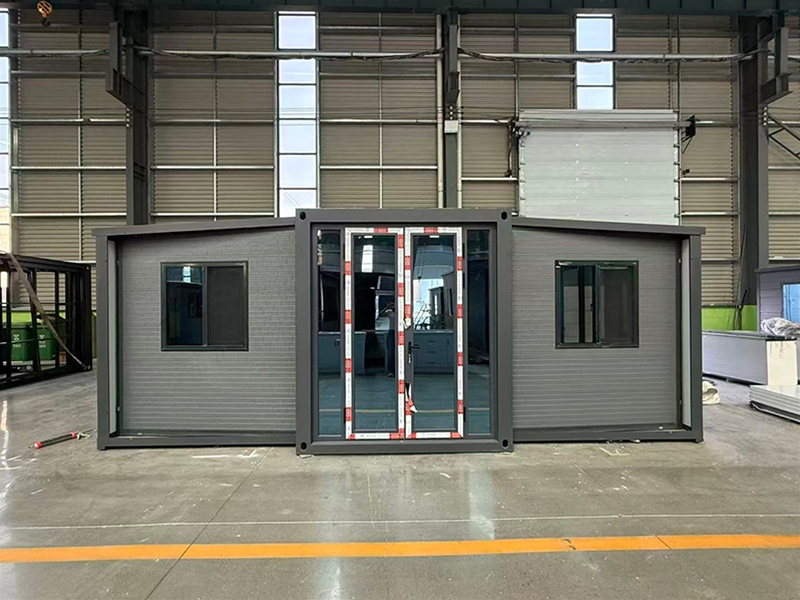 Double wing folding expansion house