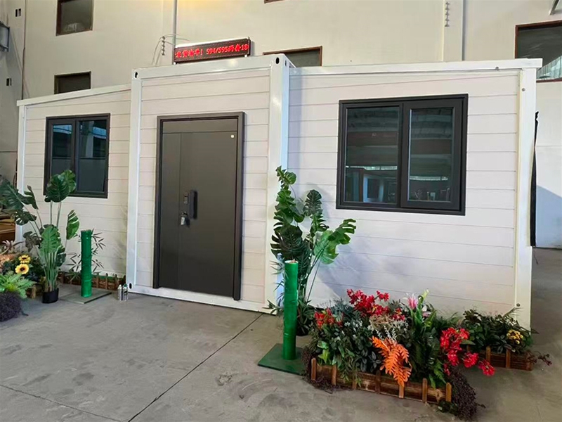 Double wing folding expansion house