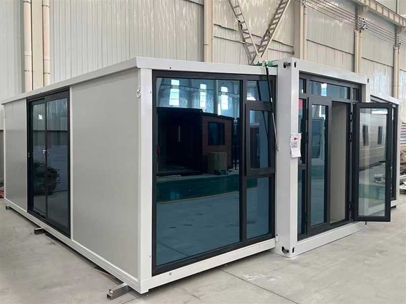 Double wing folding expansion house