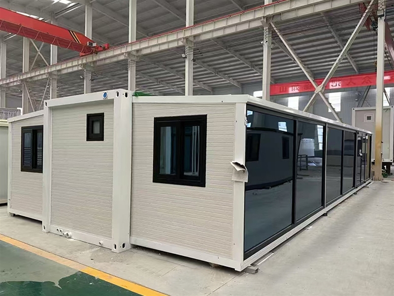 Double wing folding expansion house